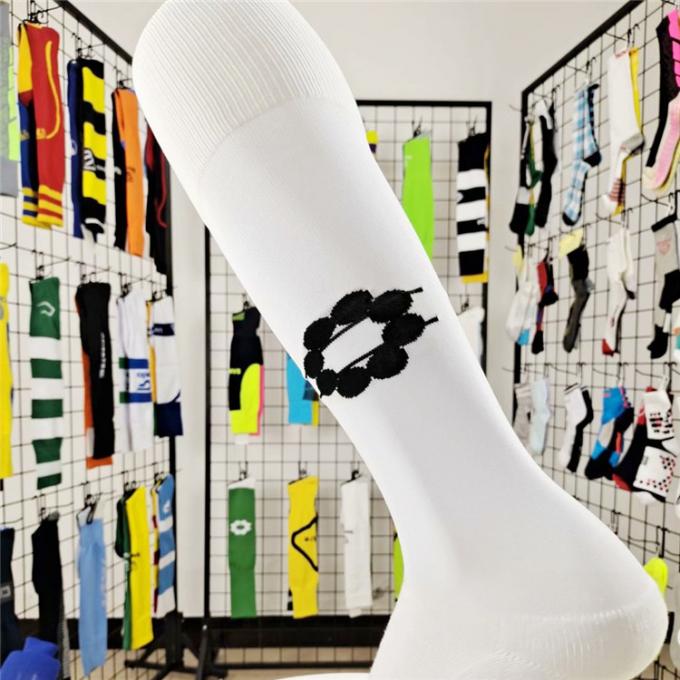 Blanco con el logotipo de encargo China haga barato sobre calcetines del fútbol de la pierna del poliéster del pie del algodón de la rodilla