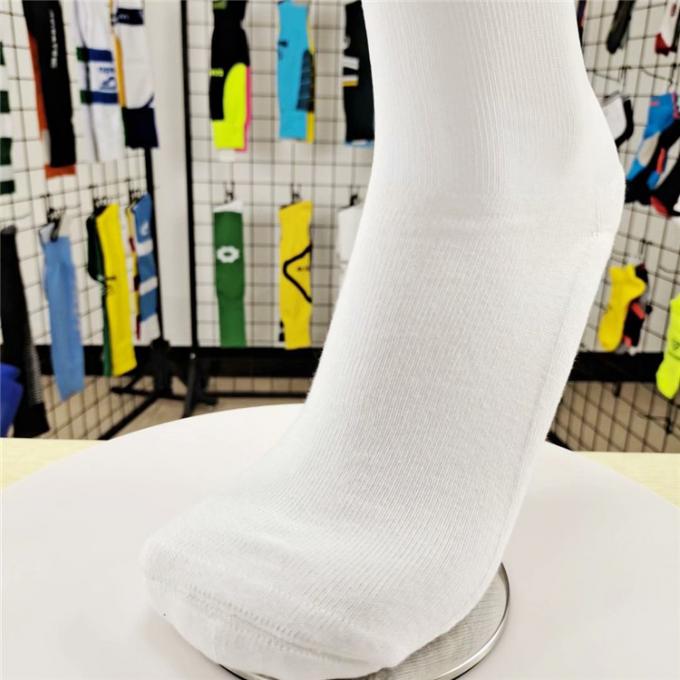 Blanco con el logotipo de encargo China haga barato sobre calcetines del fútbol de la pierna del poliéster del pie del algodón de la rodilla