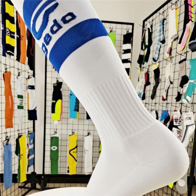 Logotipo de encargo China del verano hacer sobre la rodilla que almacena calcetines baratos del fútbol del poliéster