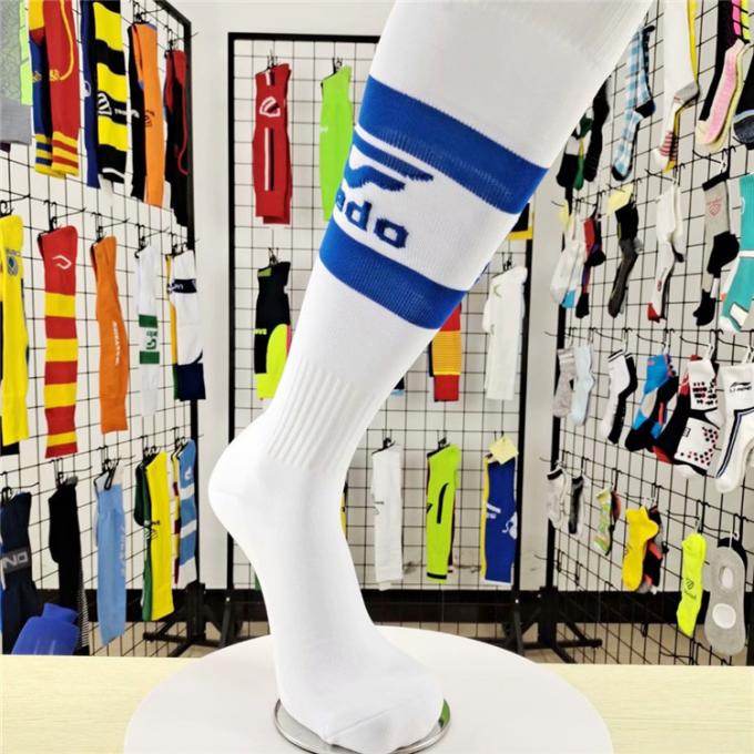 Logotipo de encargo China del verano hacer sobre la rodilla que almacena calcetines baratos del fútbol del poliéster